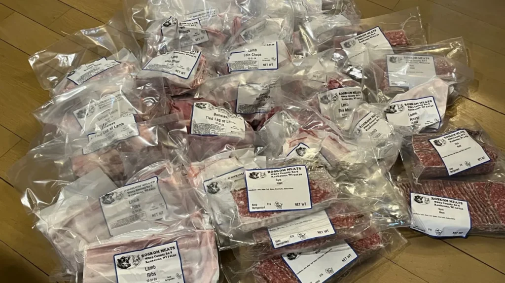 Sponsor a Lamb or Goat: image of packaged meat donations laid on a table