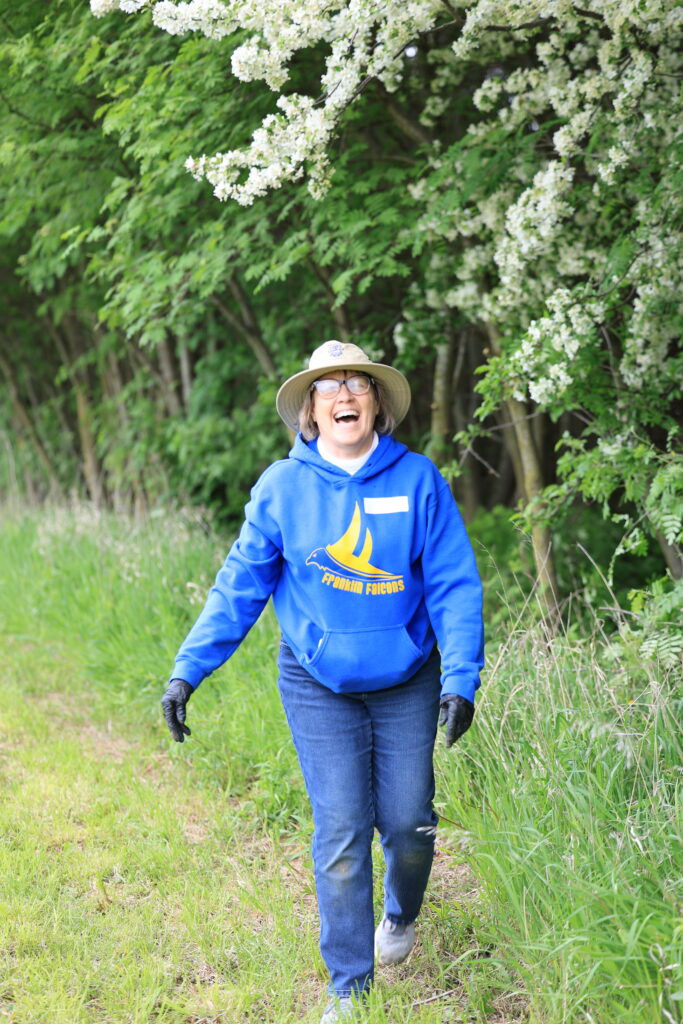 A women smiling on the trails