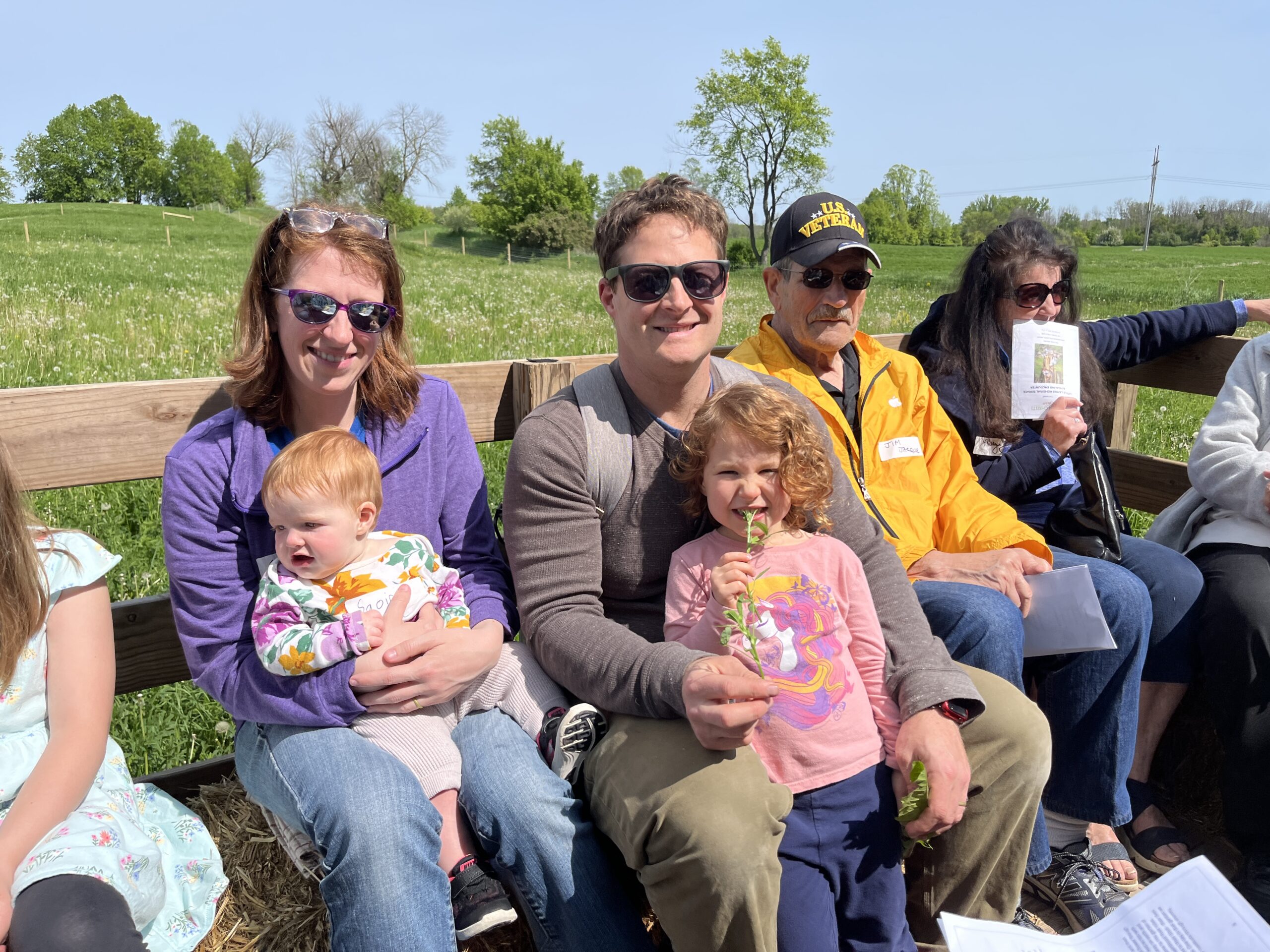 Family on a Hay Ride at Lumen Christi Farm
