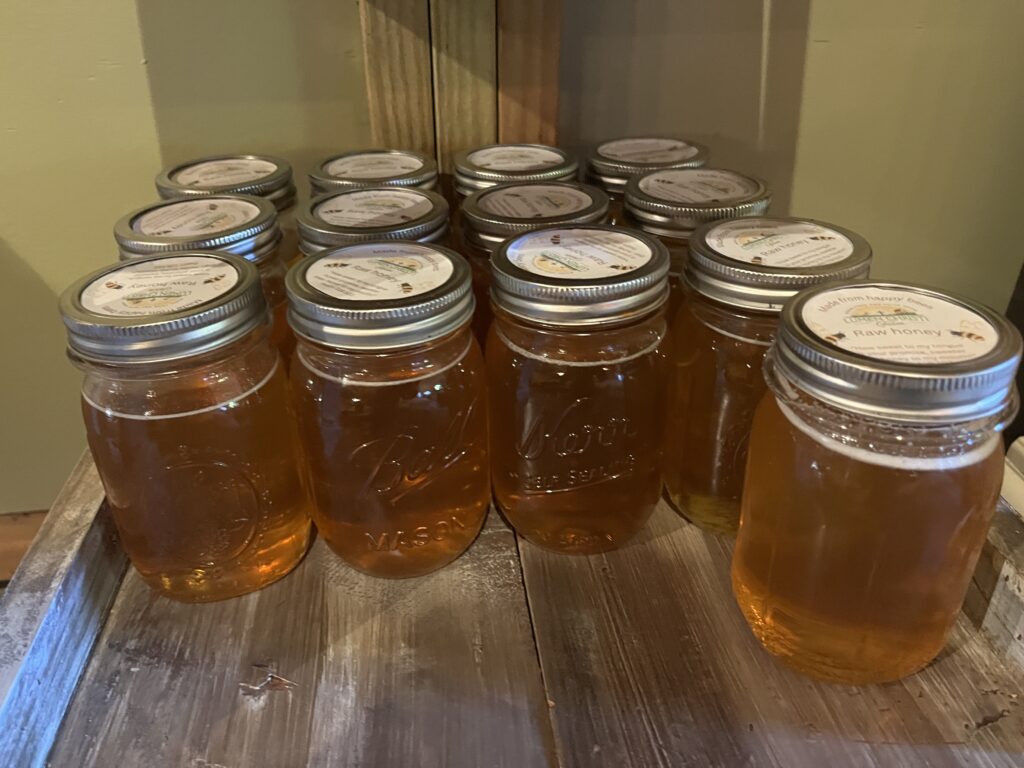 Bottles of Honey grown at Lumen Christi Farm